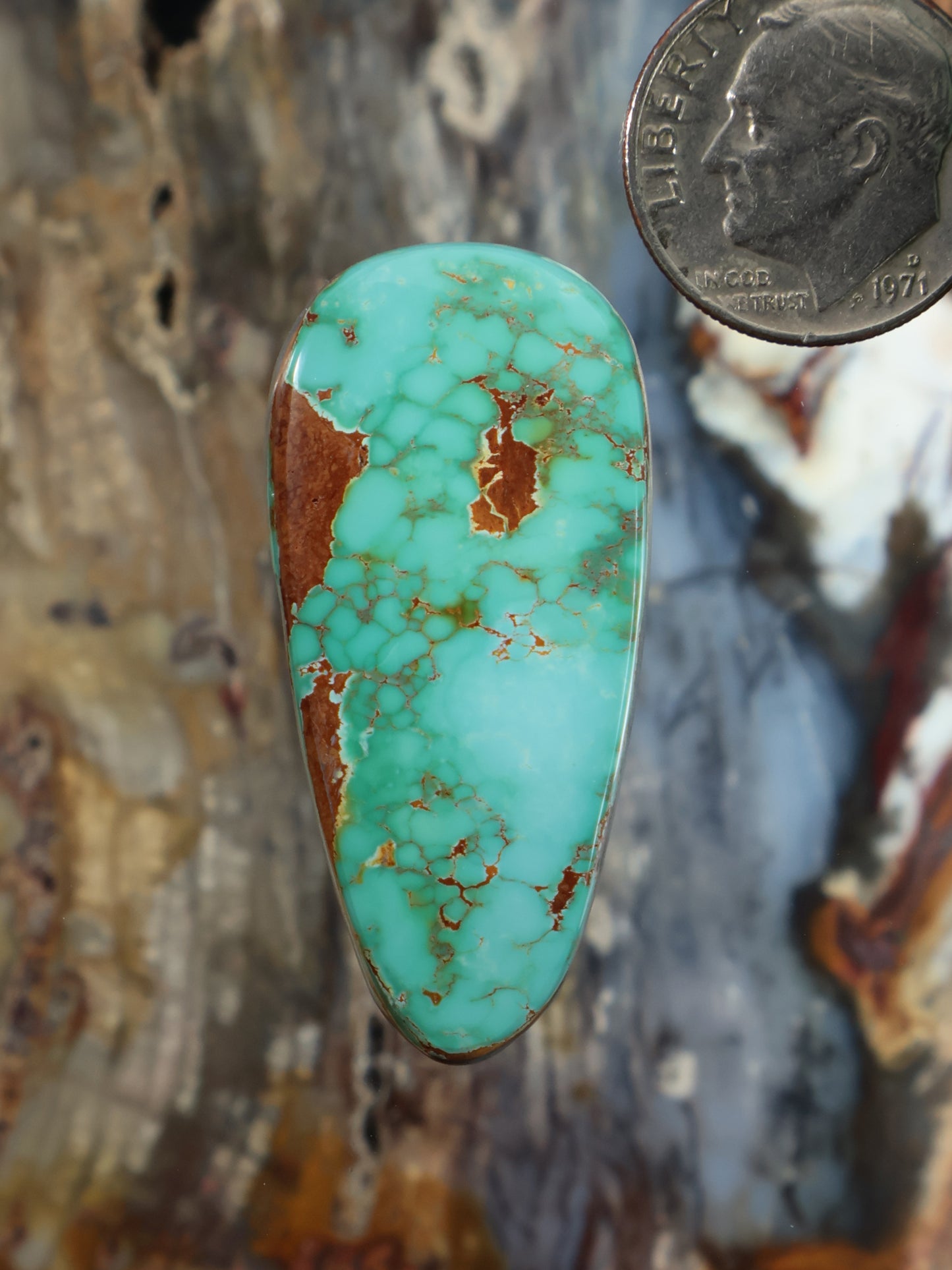 Turquoise cabochon with brown matrix webbing, teardrop shape