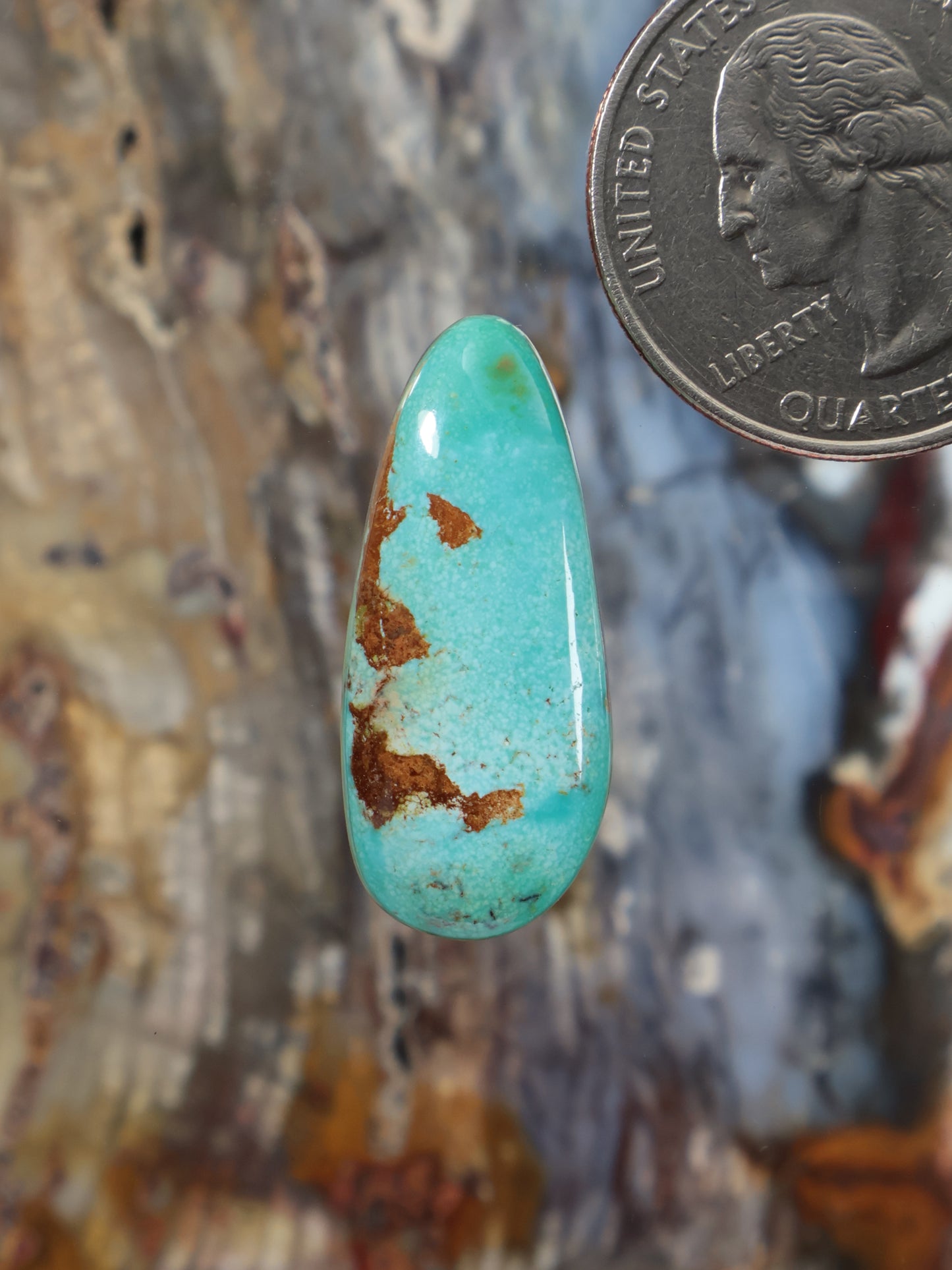 Royston turquoise cabochon, oval teardrop with natural brown matrix inclusions