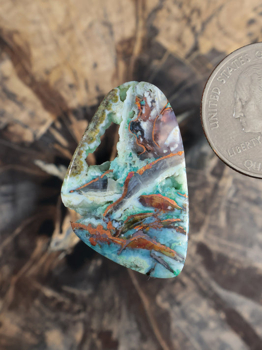 Multicolor teardrop cabochon with bright green, turquoise, and orange-brown matrix