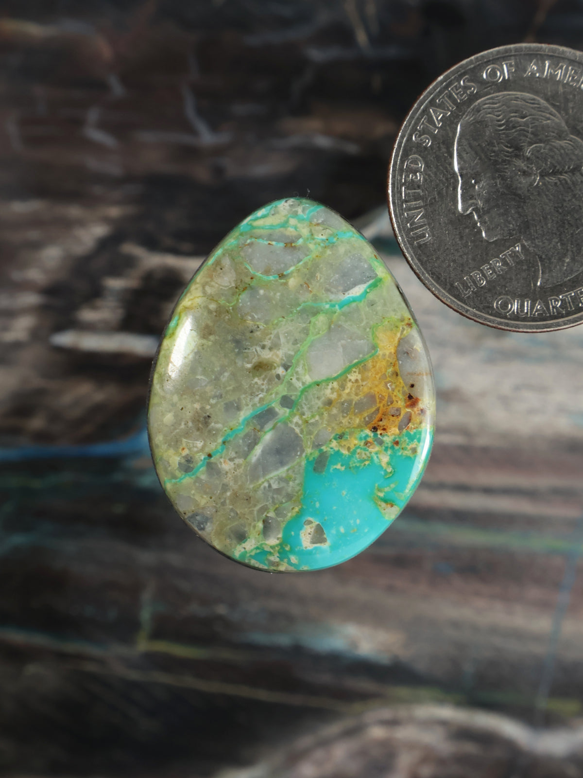 Oval turquoise cabochon with green veined matrix gemstone