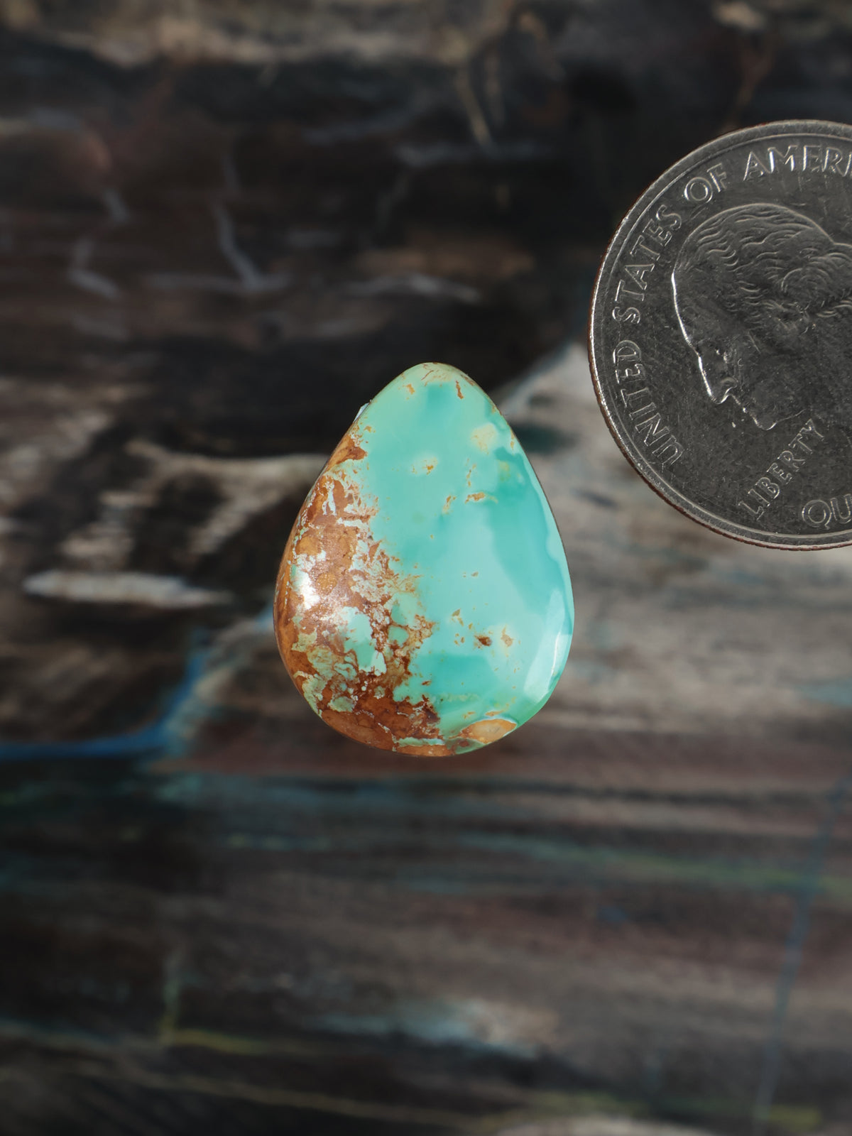 Turquoise teardrop cabochon with brown matrix, polished gemstone
