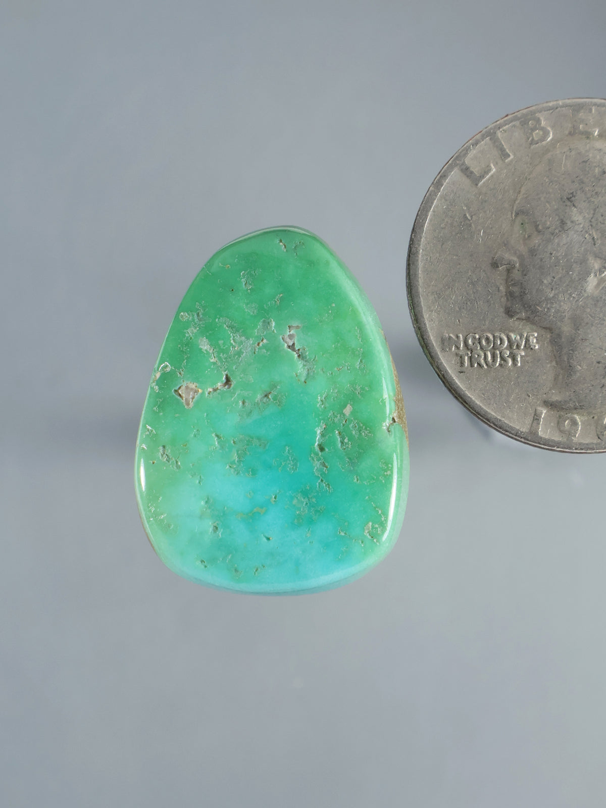 Natural Sleeping Beauty turquoise cabochon, irregular polished stone with green-blue color and matrix