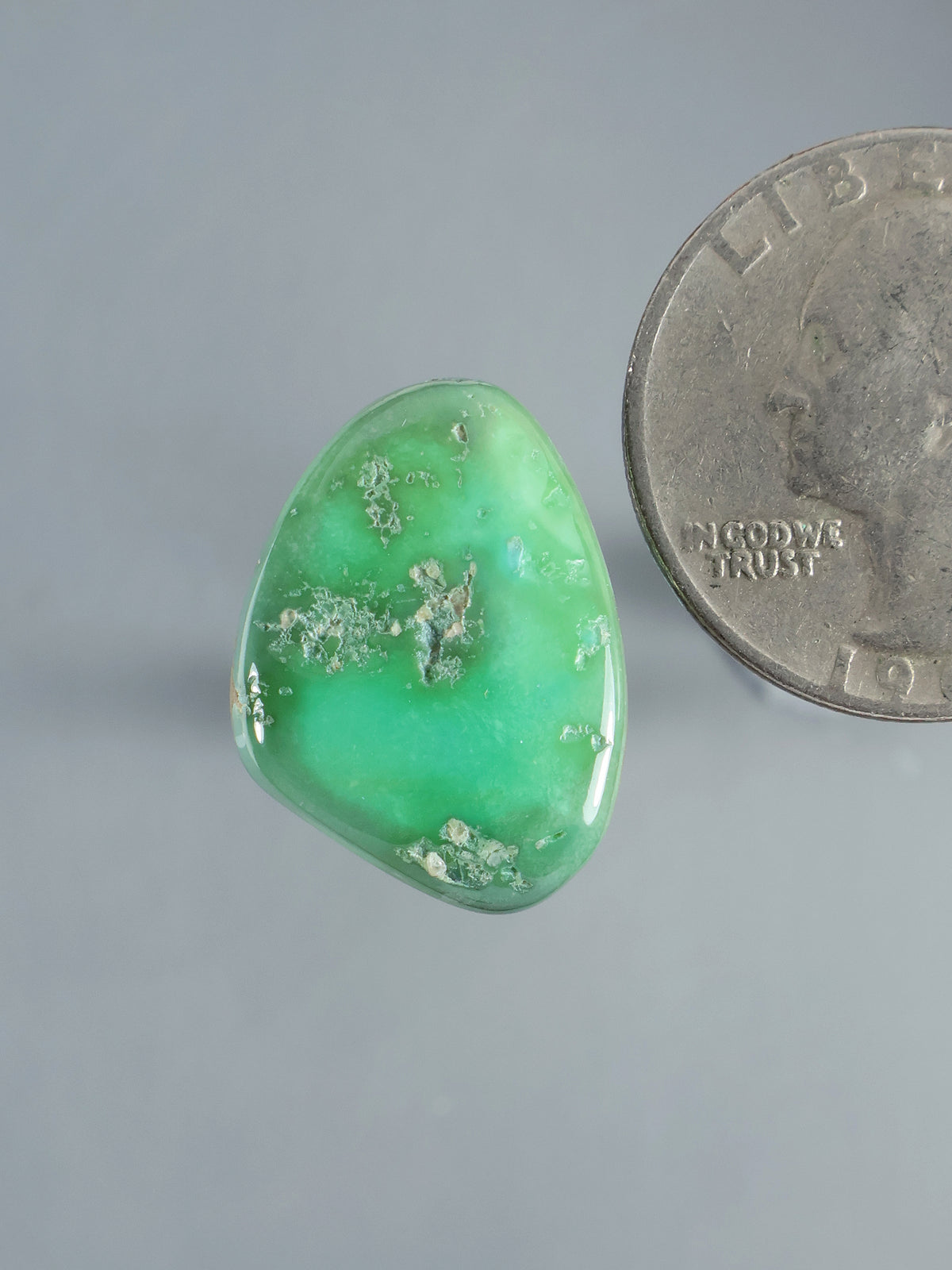 Natural Sleeping Beauty turquoise cabochon, irregular oval green stone with pale matrix veining