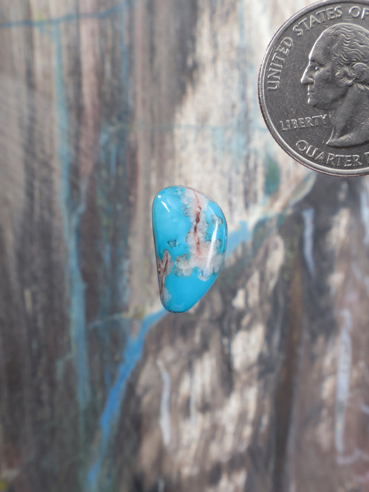 Bisbee turquoise cabochon gemstone, oval blue stone with brown matrix veining