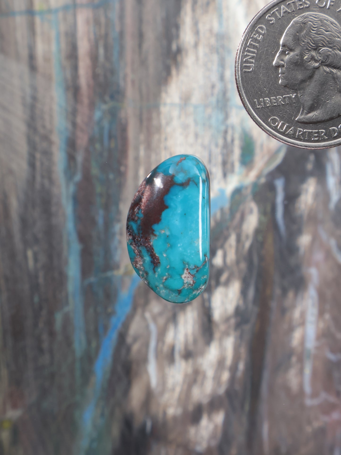 Bisbee turquoise cabochon, oval cabochon with blue face and brown marbling