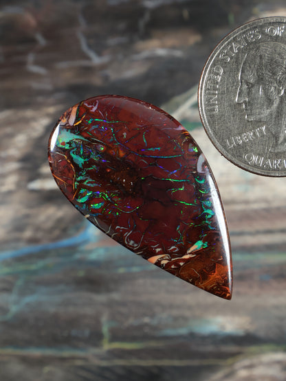 Yowah Boulder Opal cabochon (N739), teardrop red-brown with bright green-blue flashes
