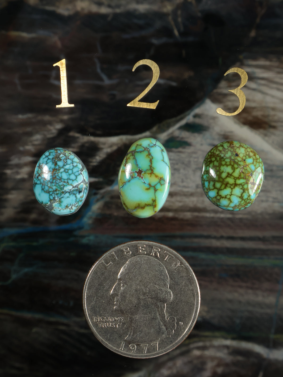 Turquoise teardrop cabochons, three-stone set with green veining