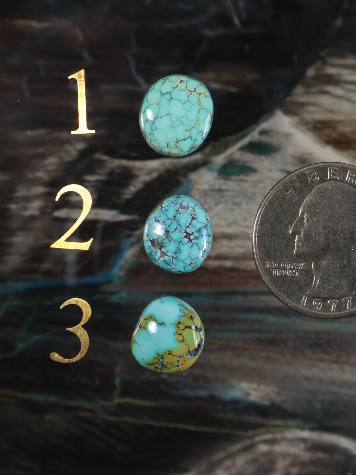 Turquoise blue round gemstone cabochon set, three stones