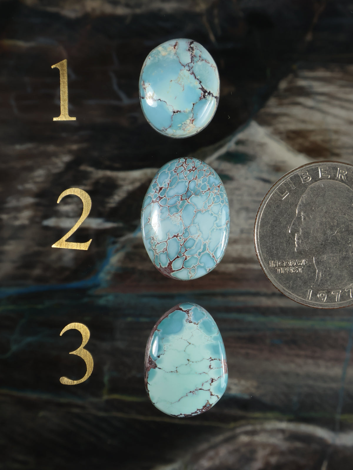 Turquoise blue oval and round cabochon stones with white veining, 3-piece set