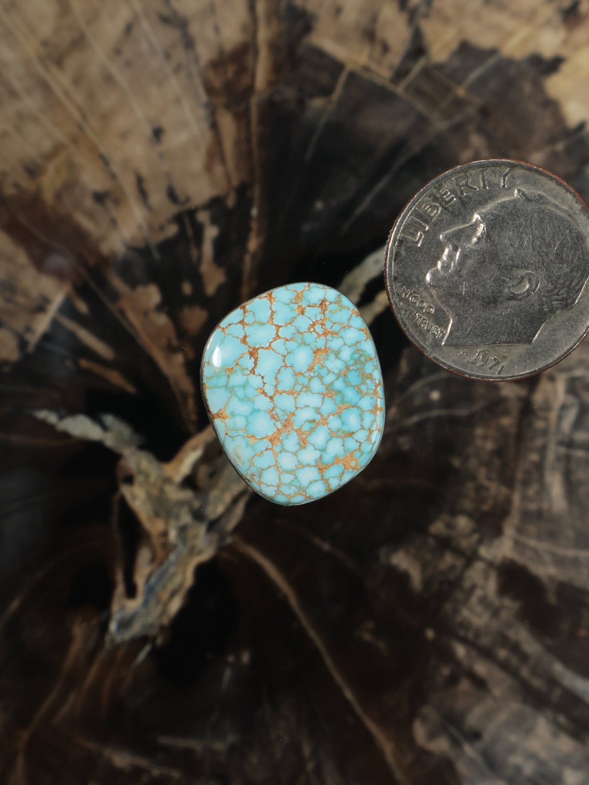 Oval Number 8 turquoise cabochon with light blue matrix pattern