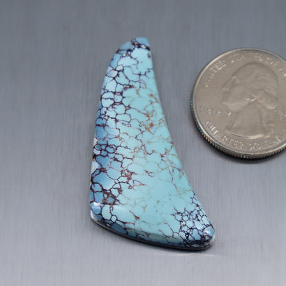 Turquoise cabochon with marbled webbing, teardrop triangle shape, smooth polished surface