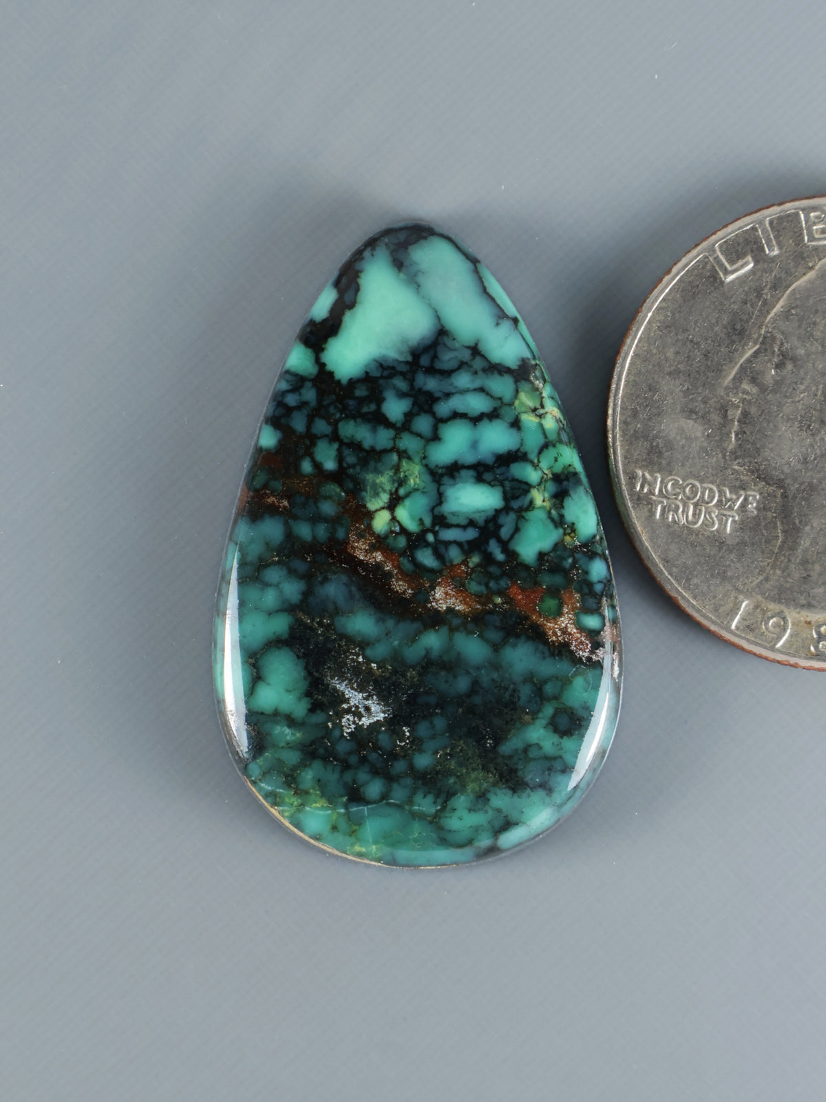 Snowville variscite cabochon, teardrop turquoise with black matrix, silver edge