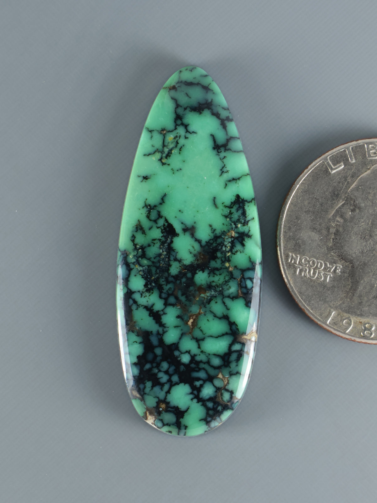 Snowville Variscite cabochon B803, teardrop with green and black veining.
