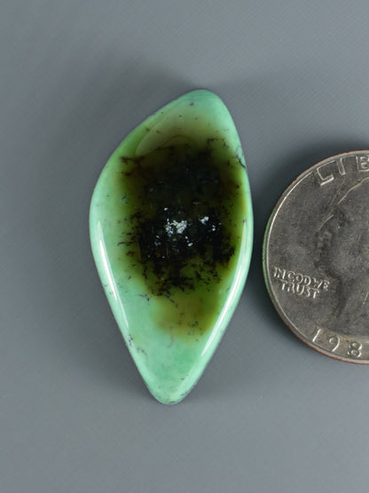 Snowville variscite cabochon, pear-shaped, light green with dark center inclusions