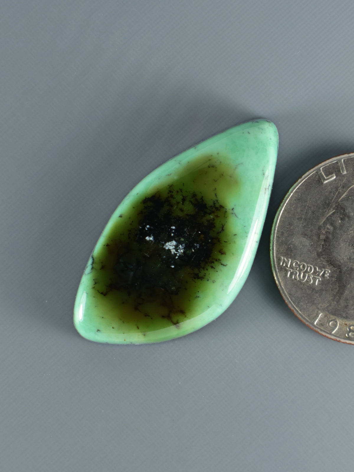 Snowville variscite cabochon, teardrop shape, mint green with dark patch