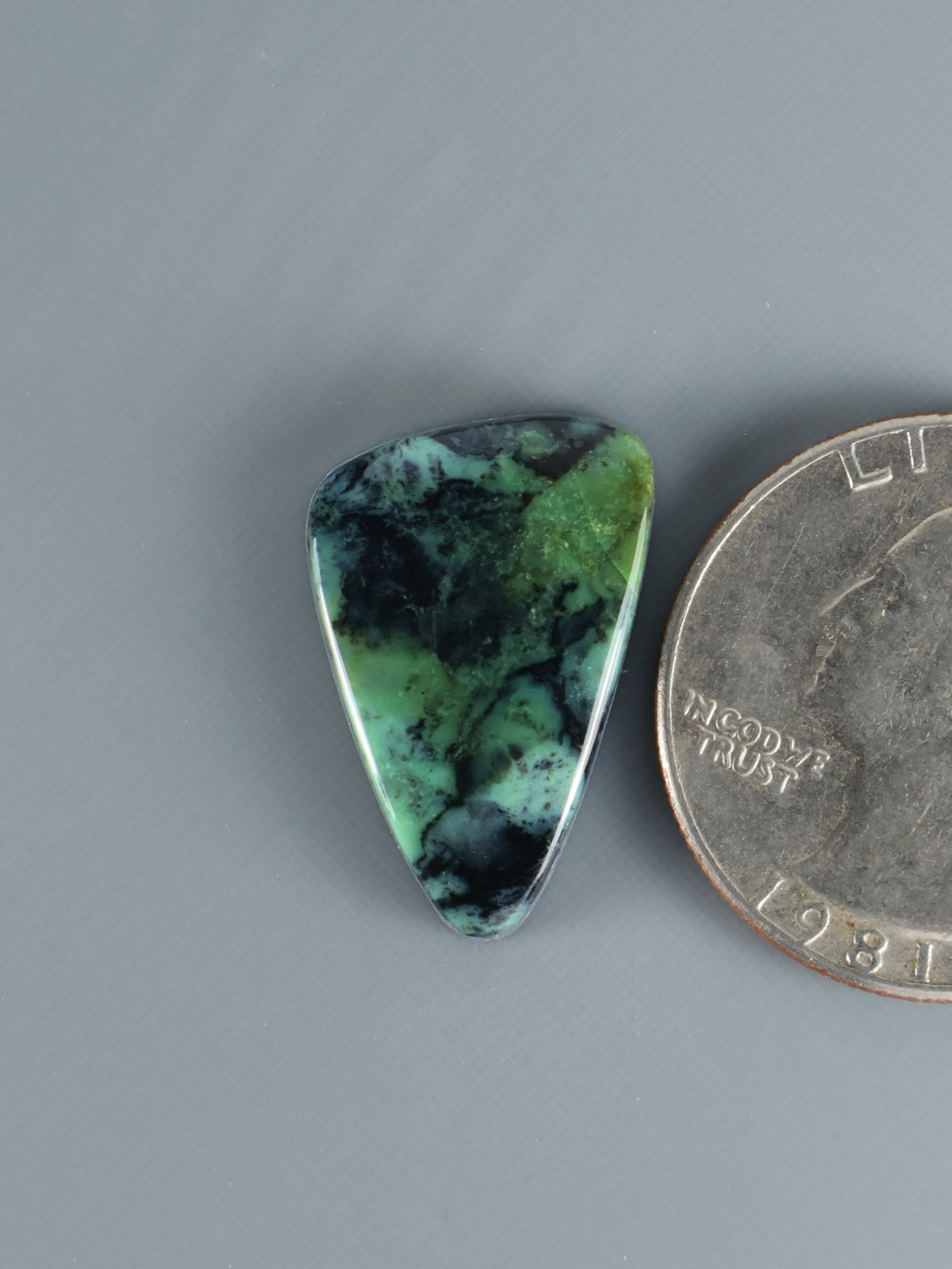 Snowville variscite cabochon, teardrop oval, vivid green with dark matrix veining