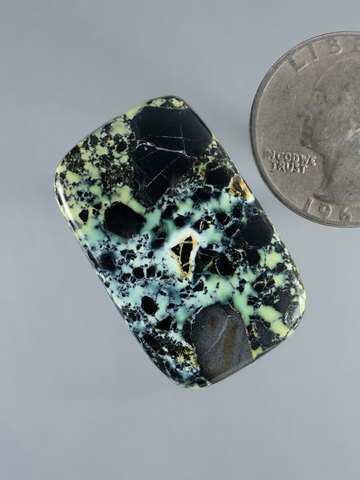 Prince Variscite cabochon, tilted oval-rectangle with black matrix and mint green veining