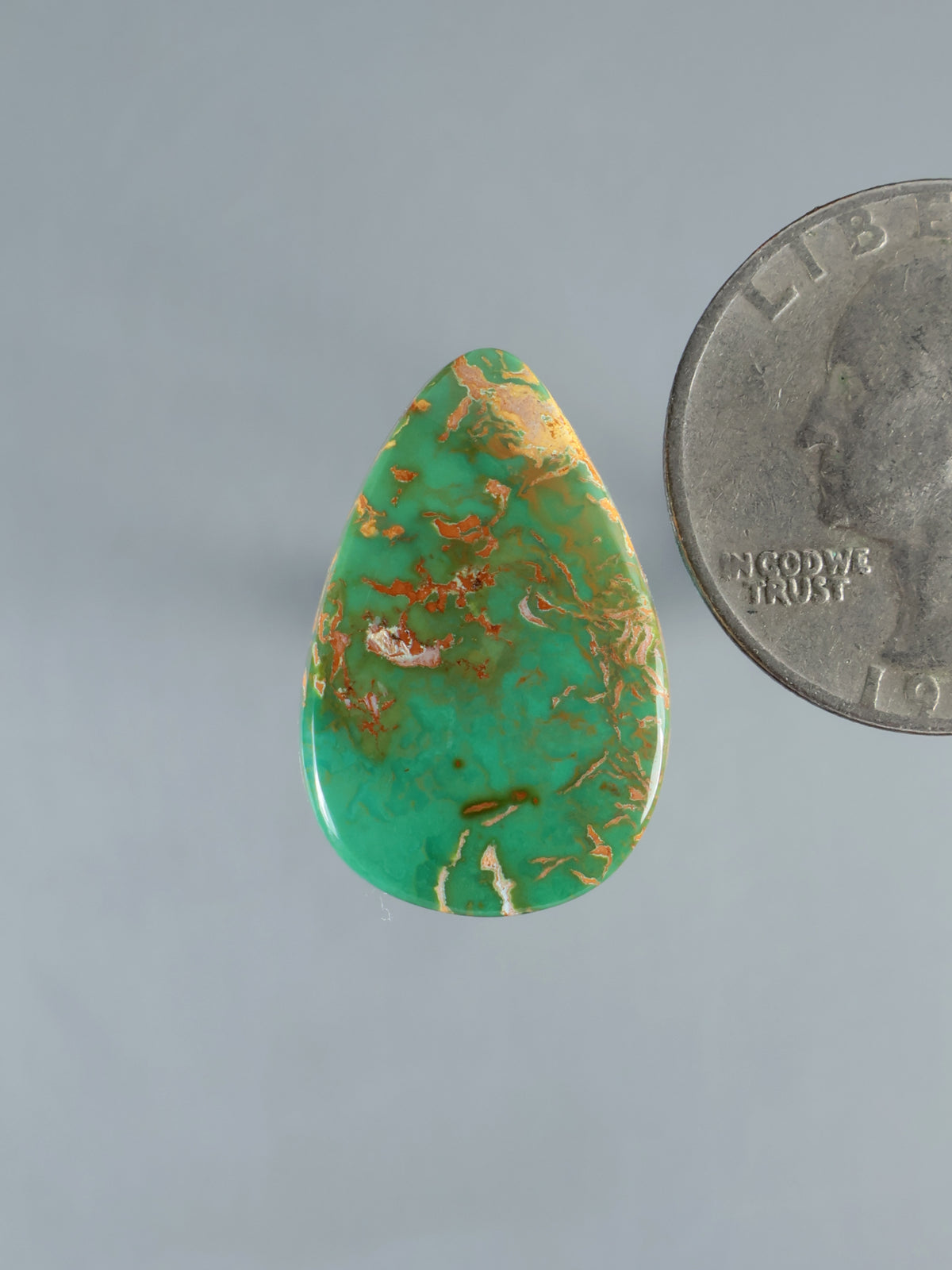Royston turquoise cabochon teardrop with green and red matrix