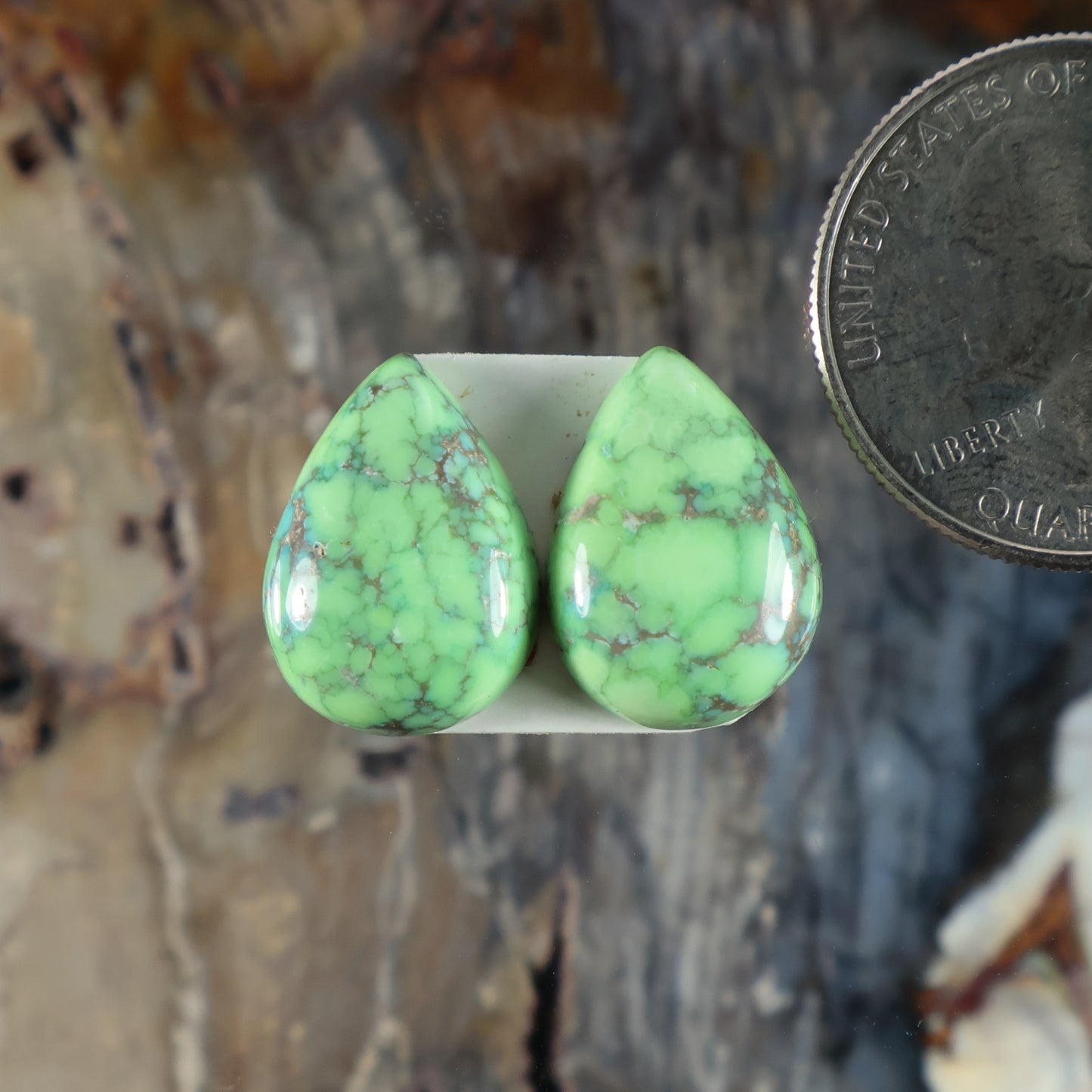 Turquoise teardrop cabochon pair, smooth green stones with natural matrix lines