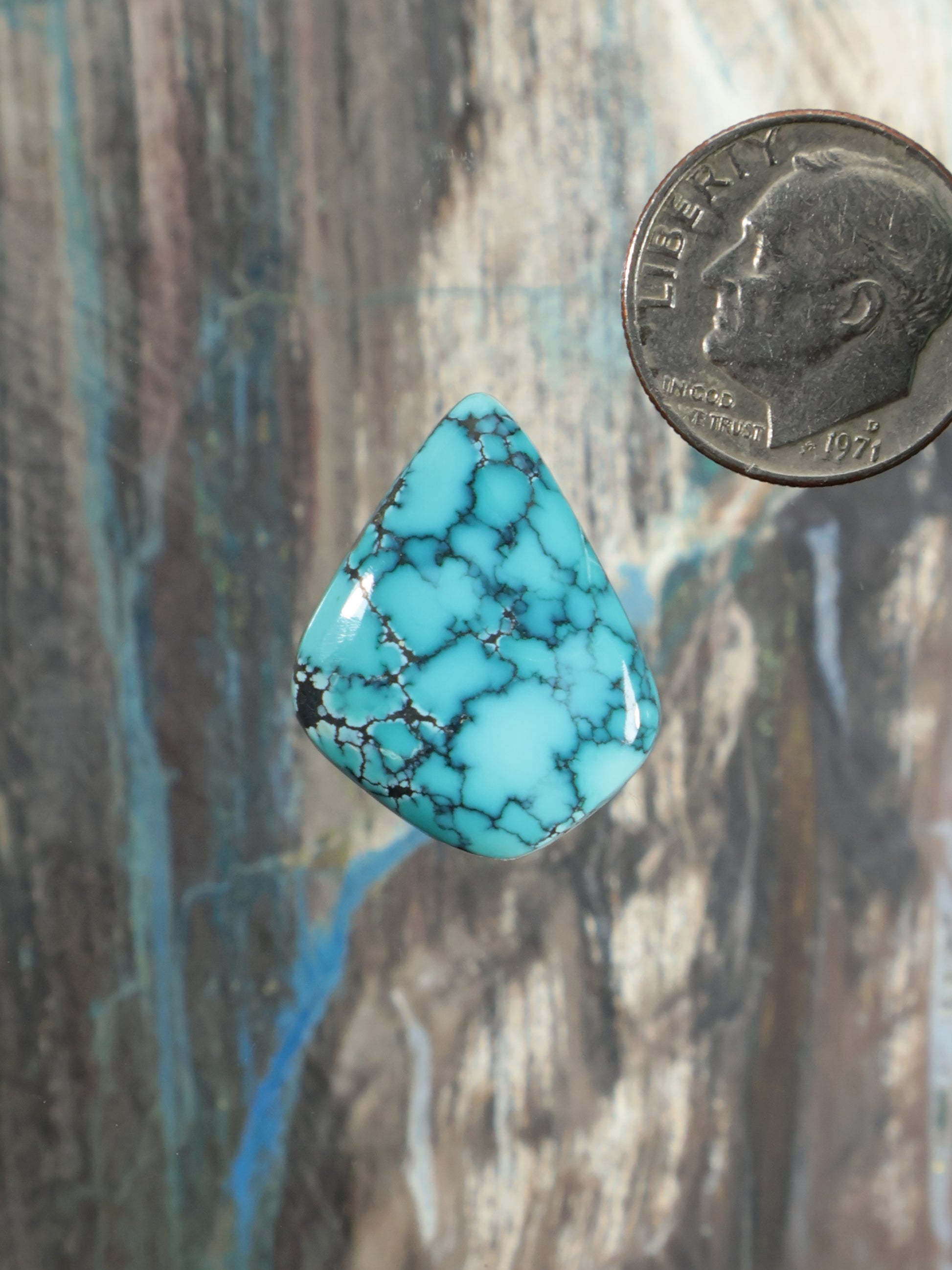 Turquoise cabochon teardrop with webbed matrix, blue-green stone