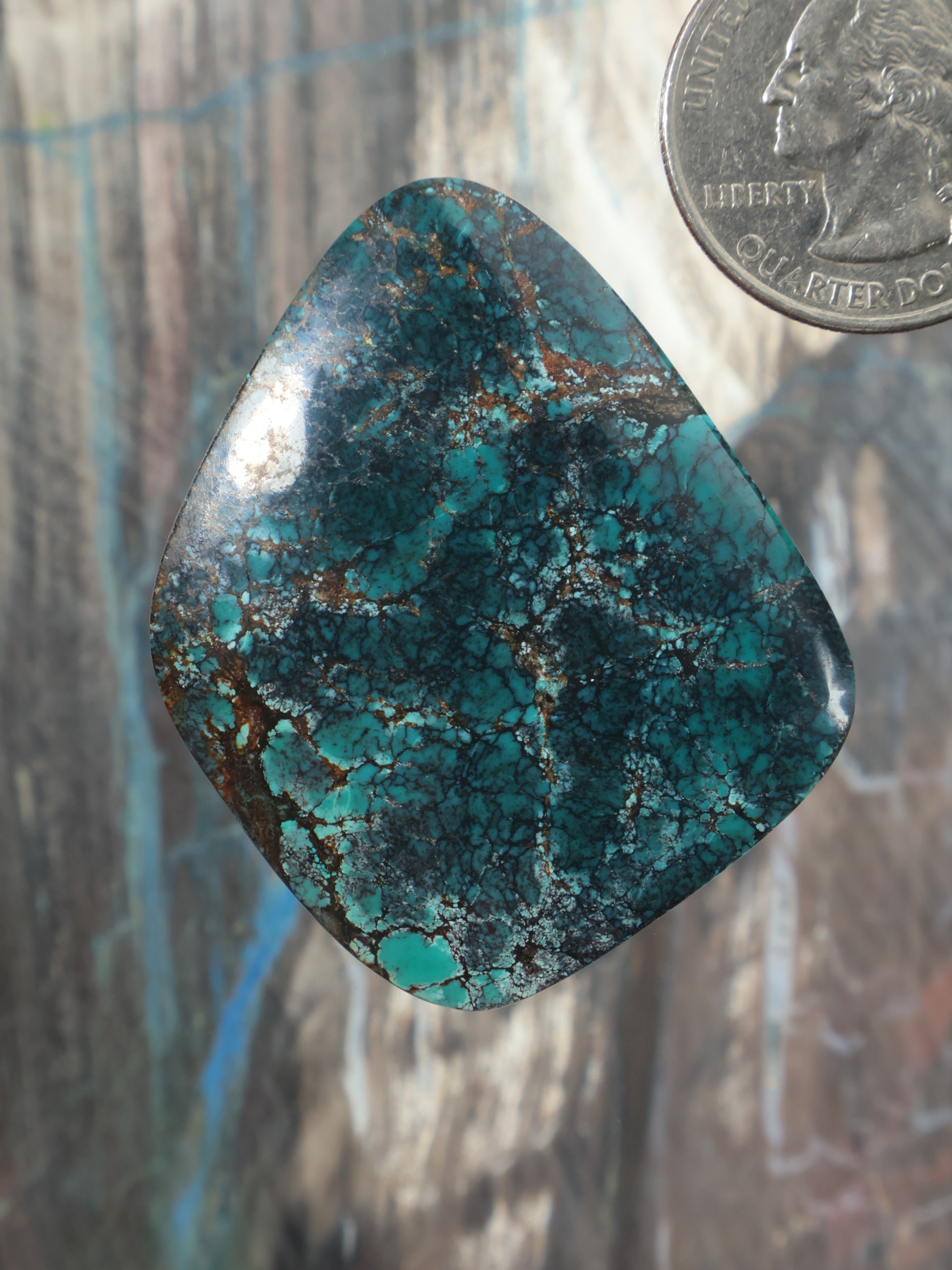 Hubei turquoise cabochon, oval cushion shape with natural matrix webbing