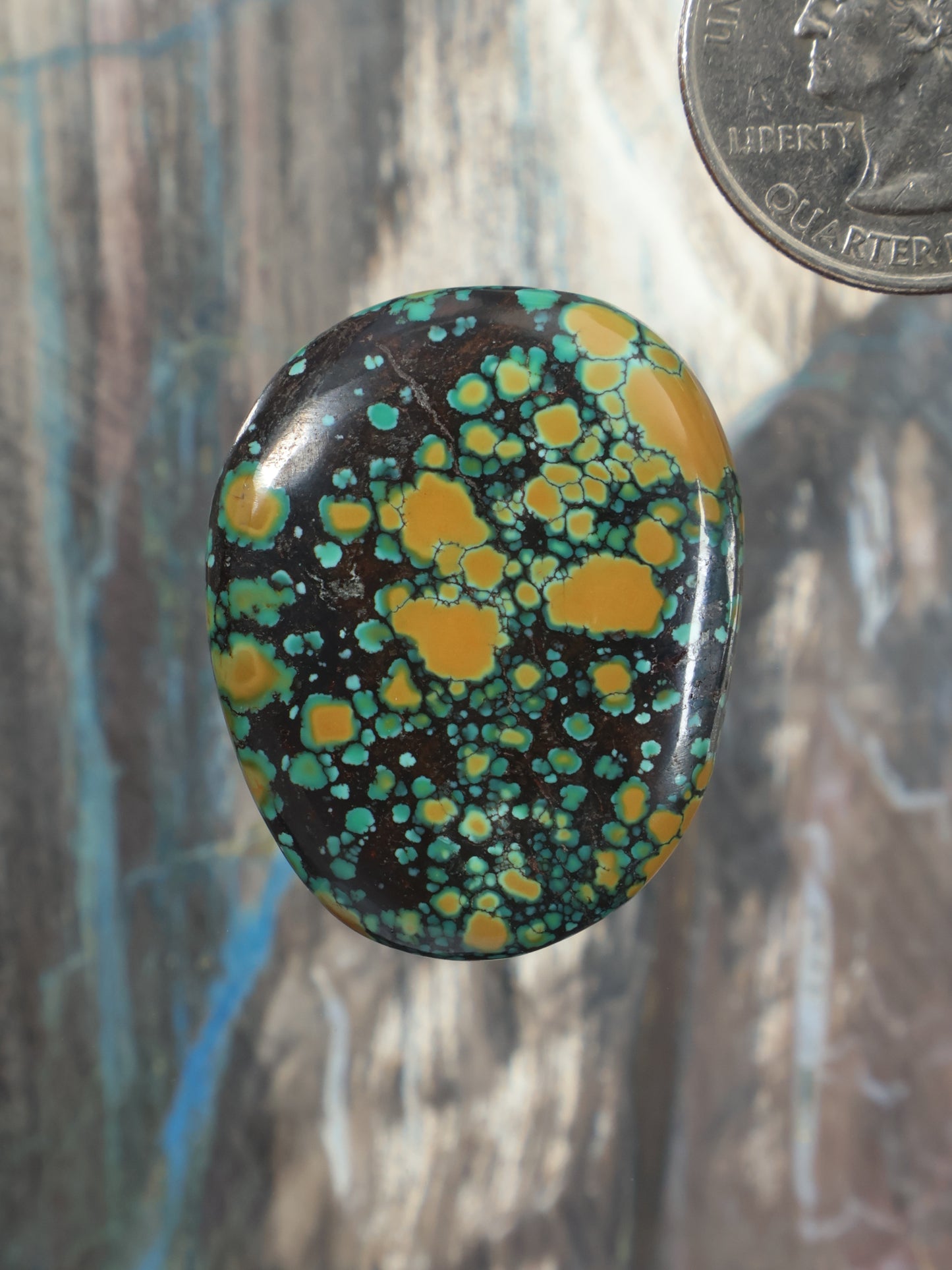 Hubei turquoise cabochon oval with green and yellow speckled pattern
