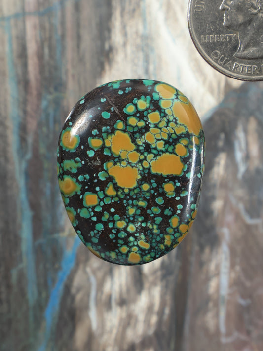 Hubei turquoise cabochon oval with green and yellow speckled pattern