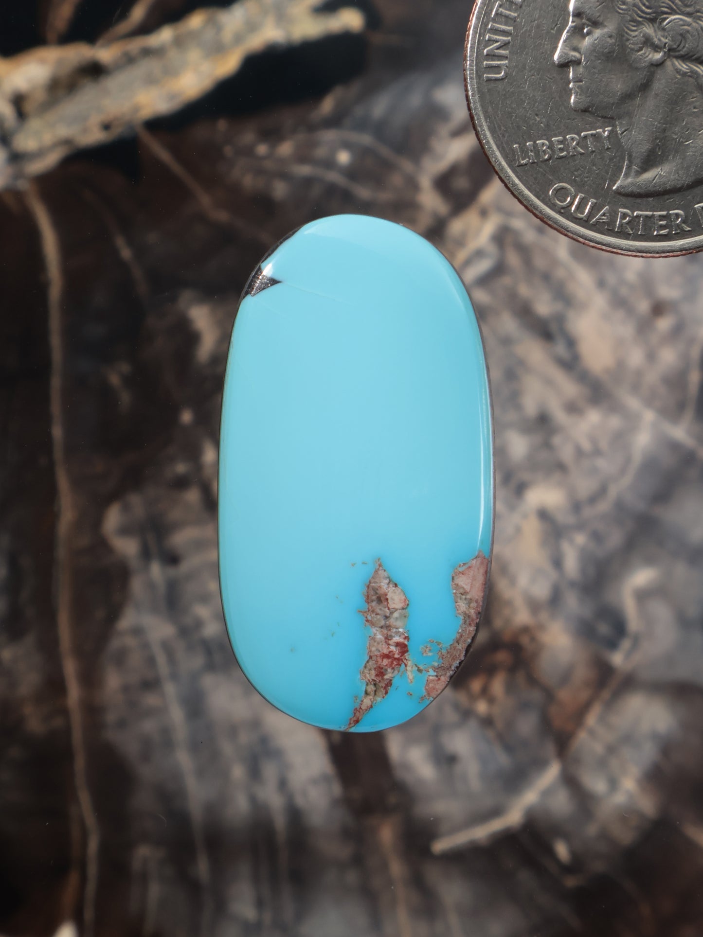 Sleeping Beauty turquoise cabochon, oval with brown matrix detail
