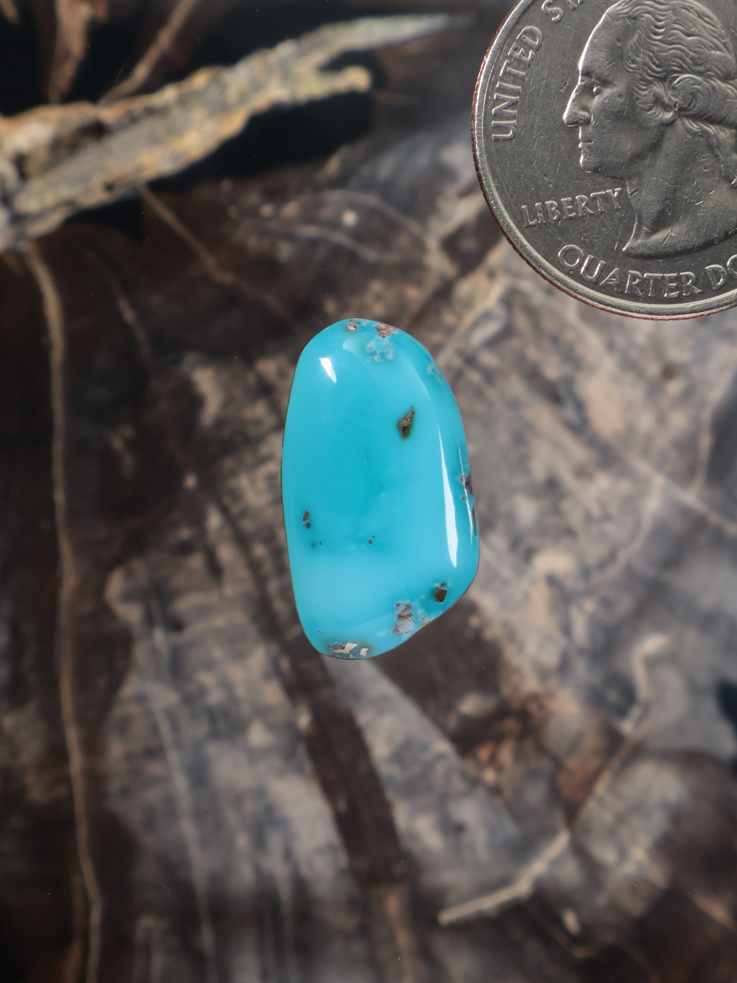 Sleeping Beauty turquoise oval cabochon with natural matrix specks