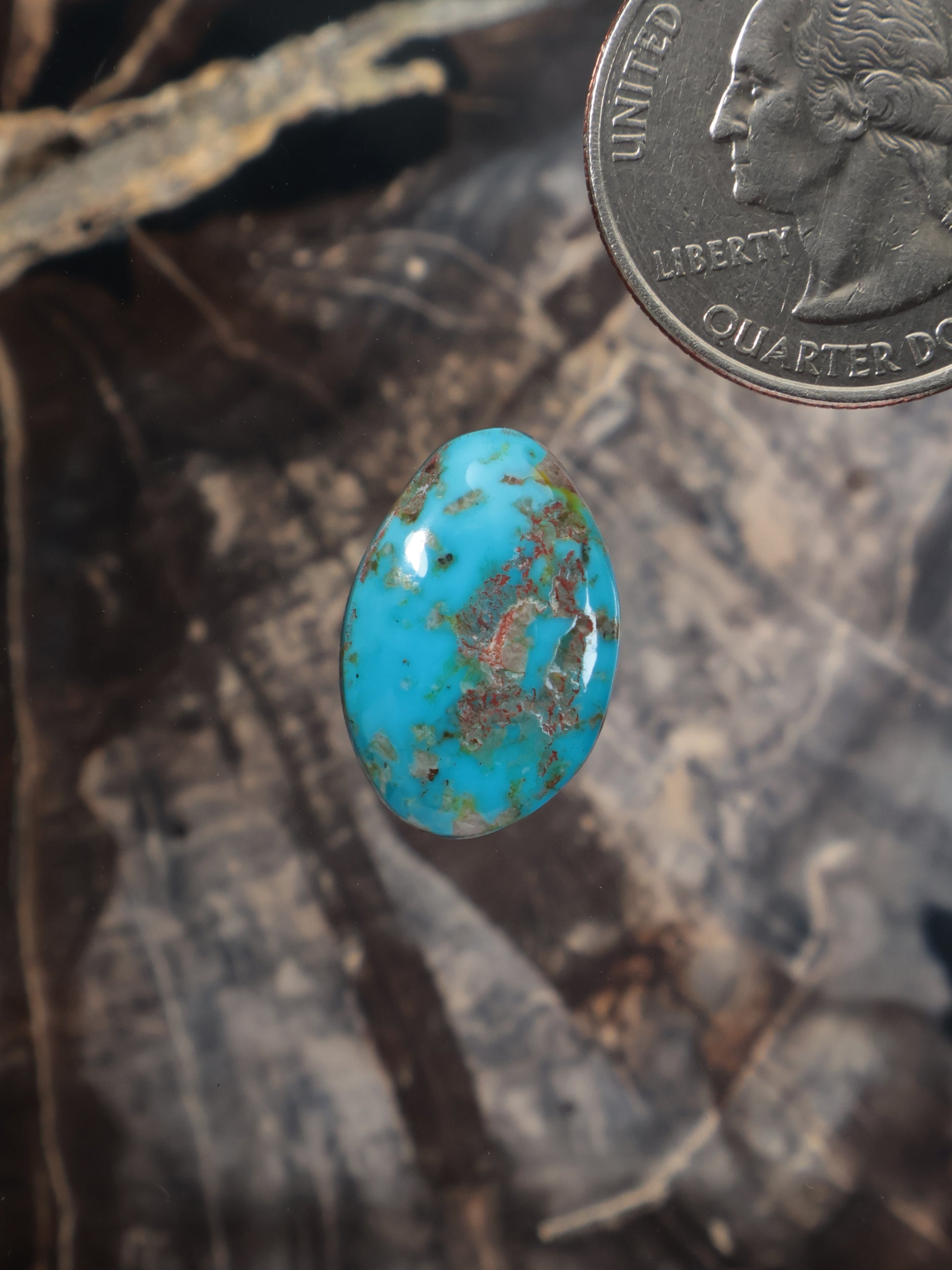 Turquoise cabochon gemstone with natural matrix, oval shape