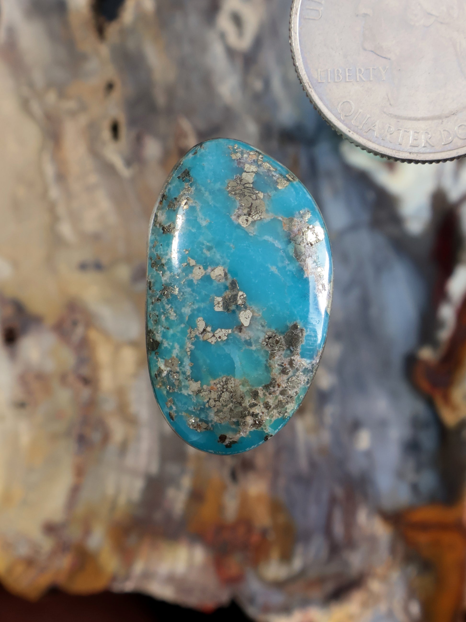 Oval turquoise cabochon gemstone