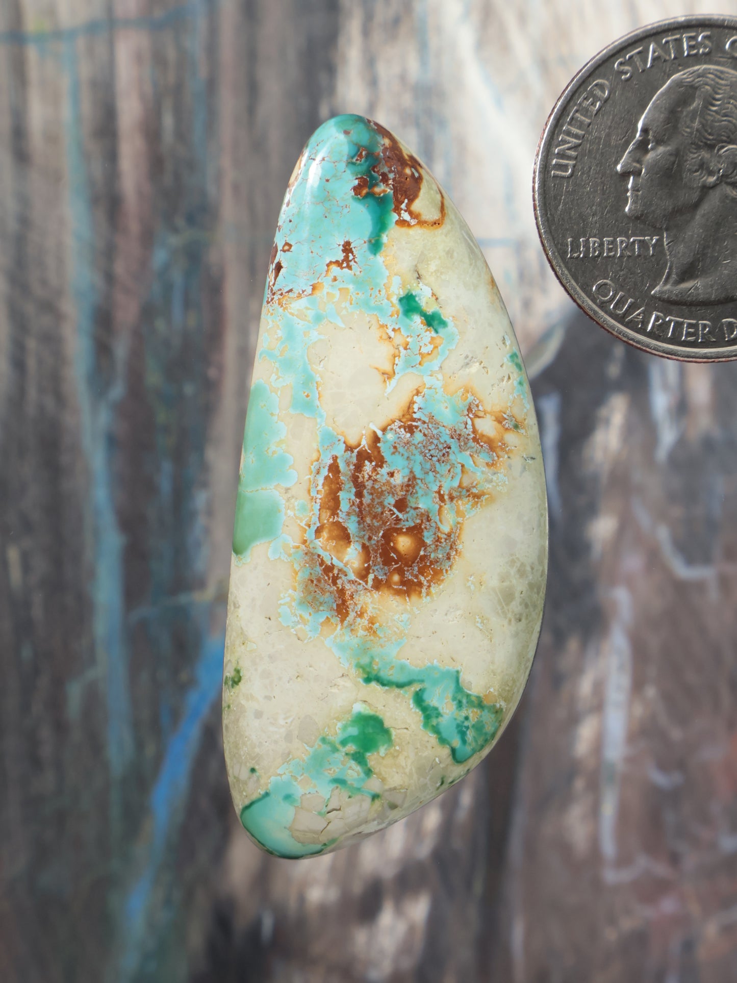 Turquoise boulder cabochon gemstone, oval with green-blue and golden matrix