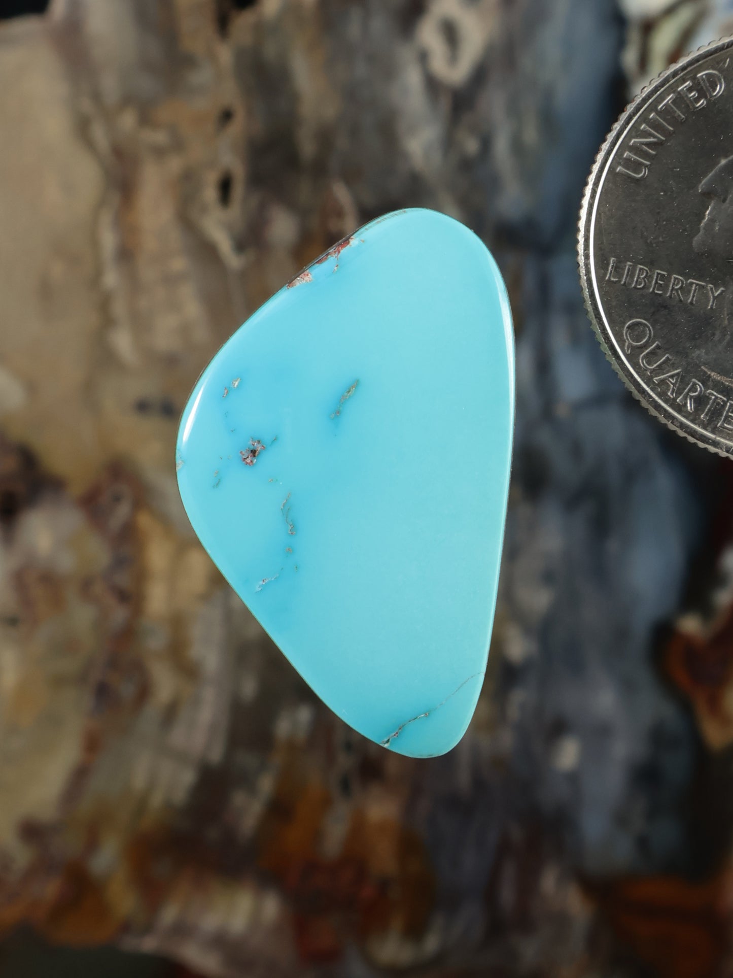 Sleeping Beauty turquoise cabochon, oval blue stone with fine dark matrix lines