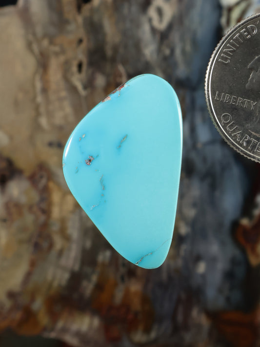 Sleeping Beauty turquoise cabochon, oval blue stone with fine dark matrix lines