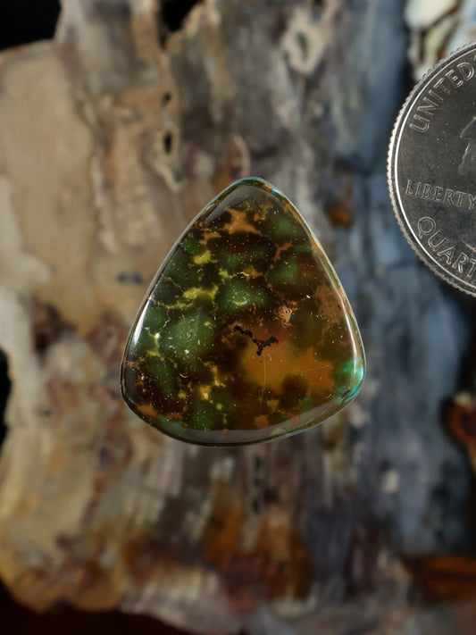 Teardrop turquoise cabochon with green and brown webbed pattern