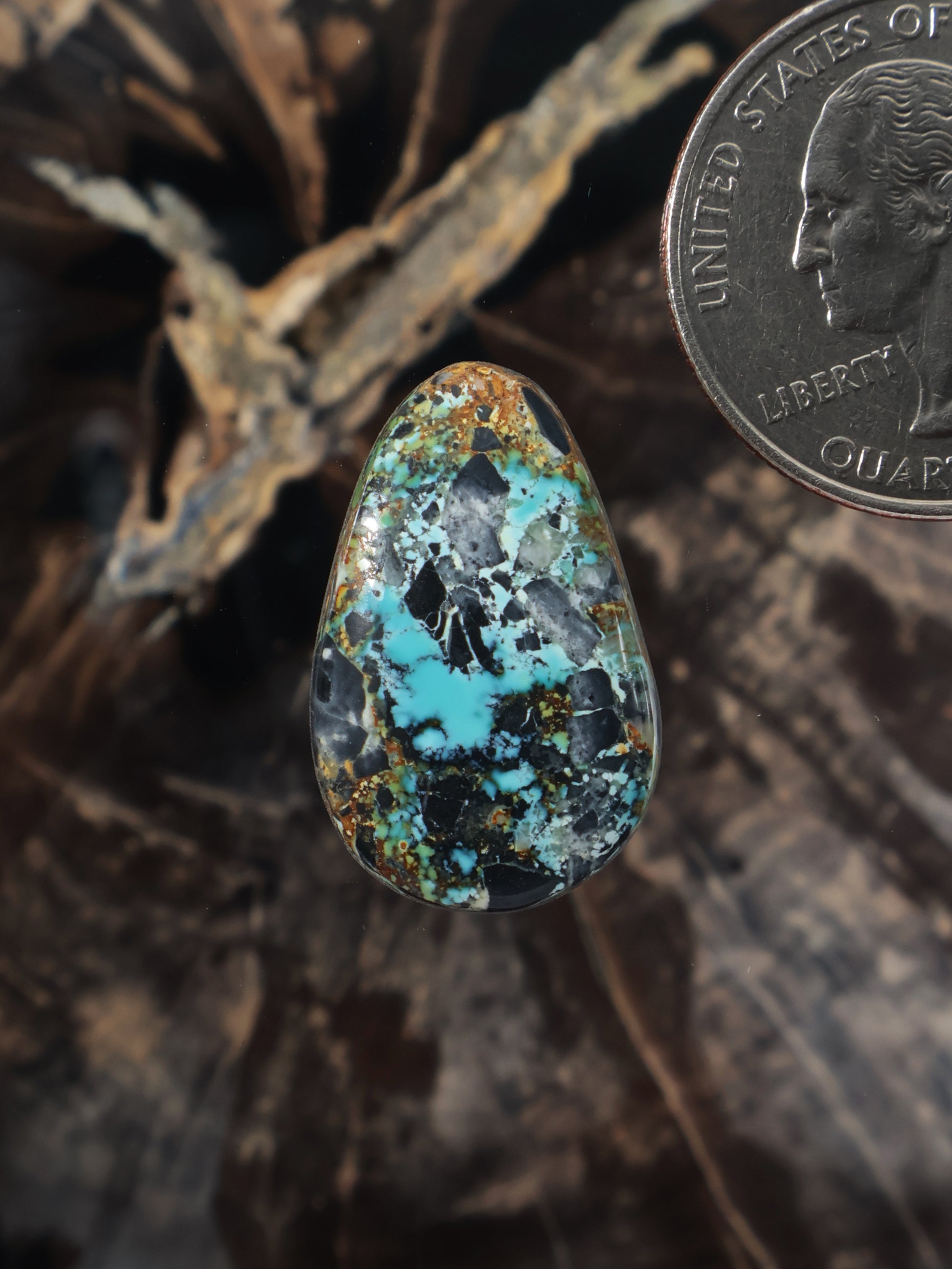 Polychrome turquoise oval cabochon gemstone