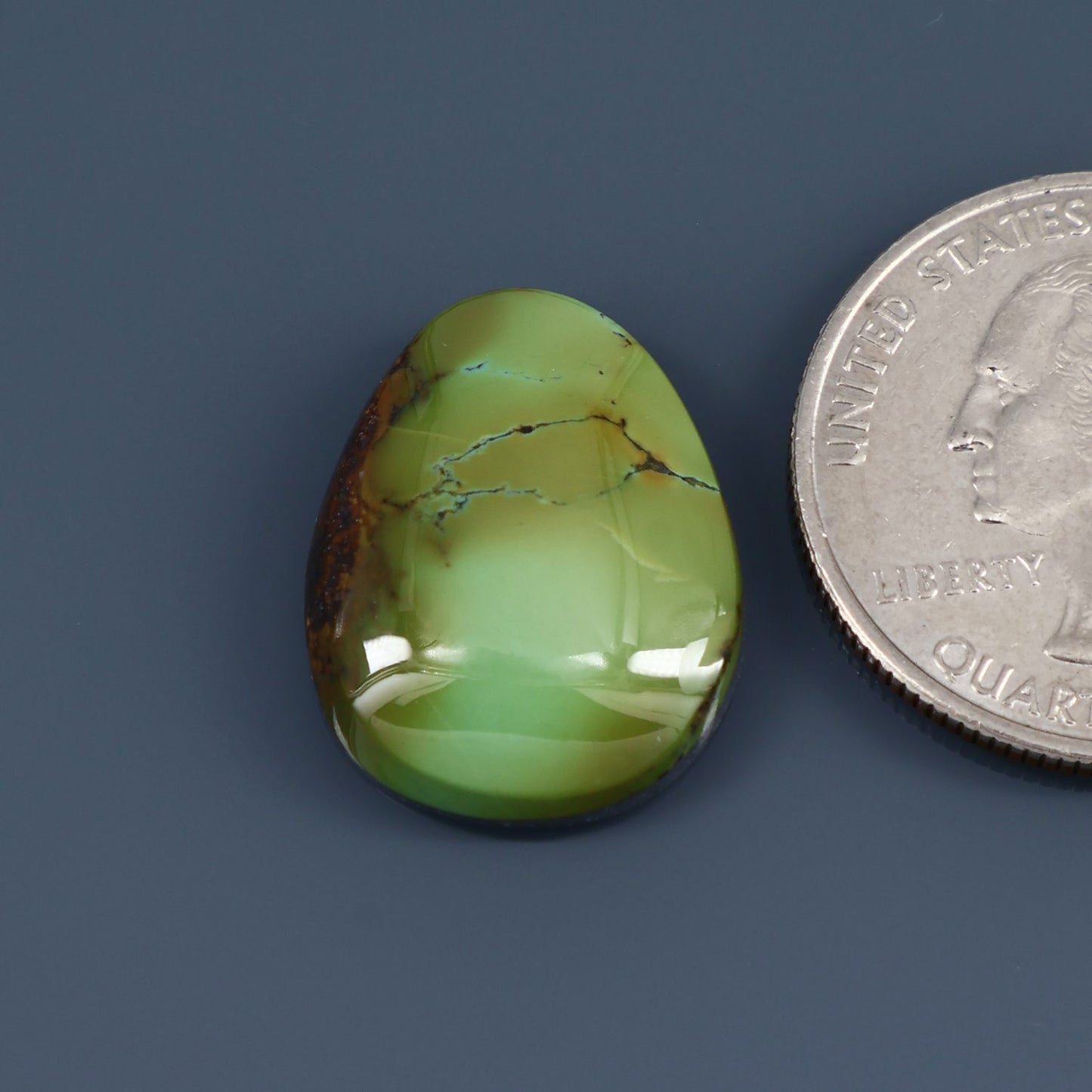 Green turquoise cabochon, teardrop-shaped with glossy lime green finish