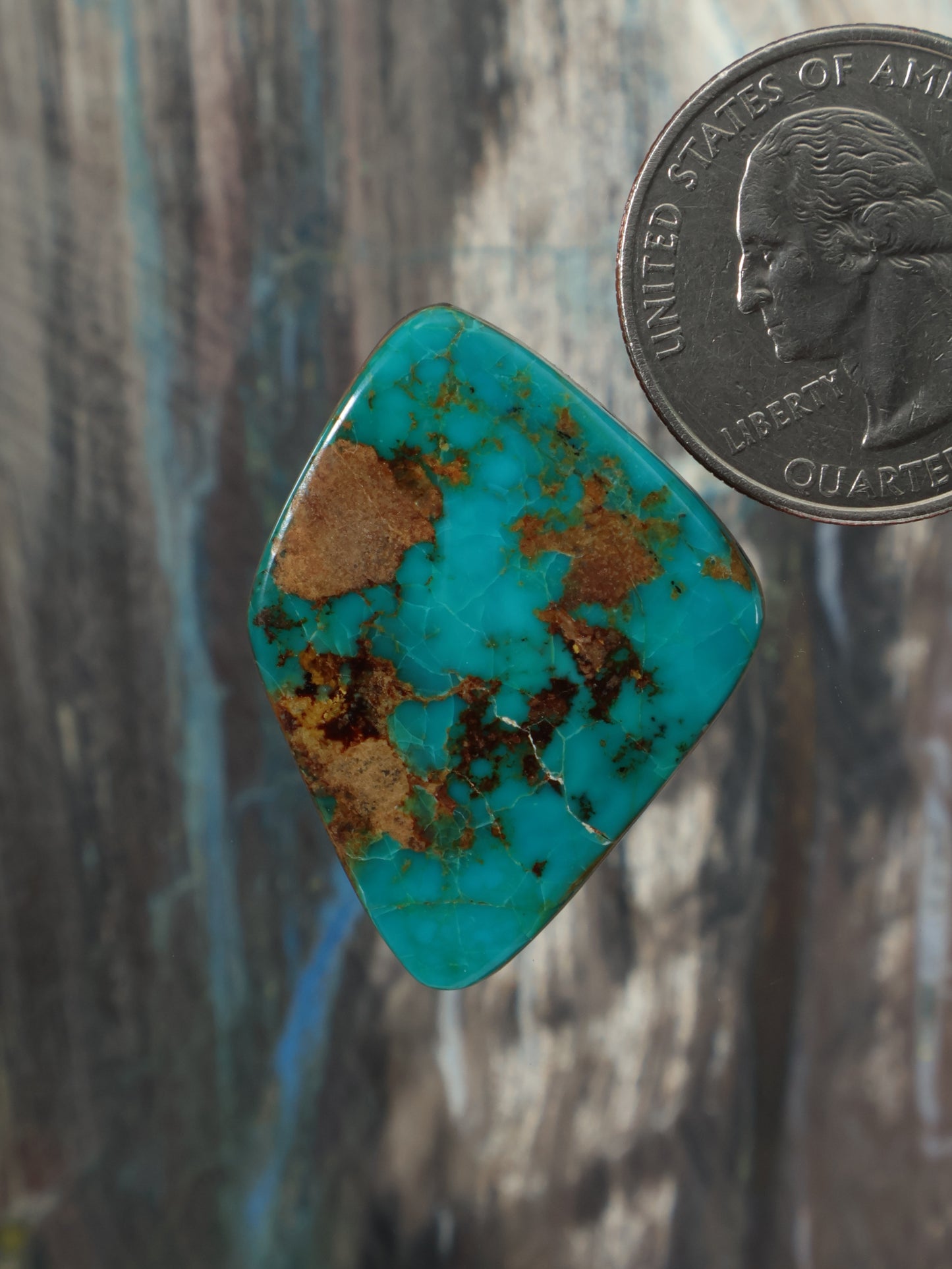 Turquoise cabochon with brown matrix, diamond-shaped gemstone