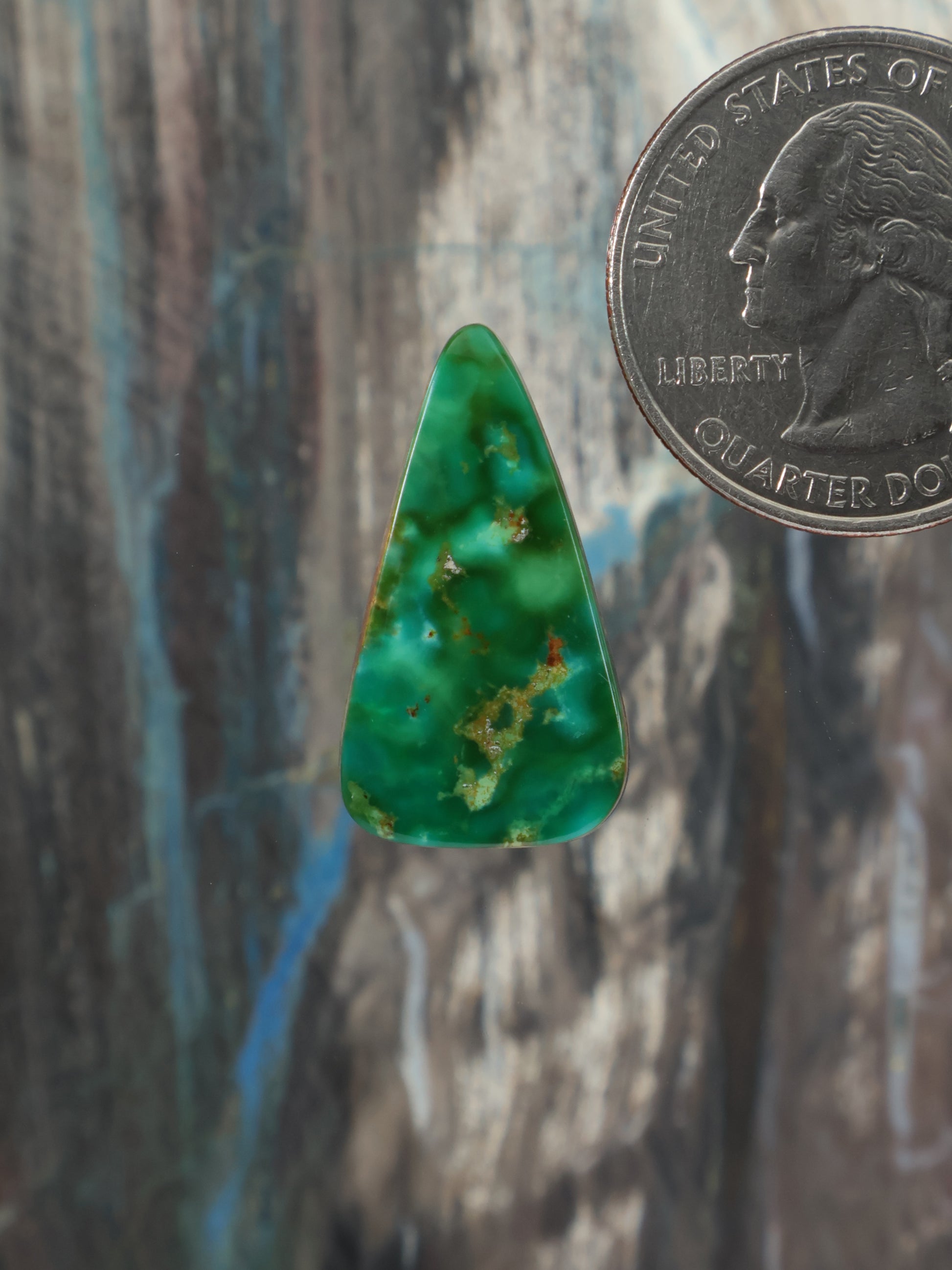 Green turquoise cabochon teardrop with golden matrix