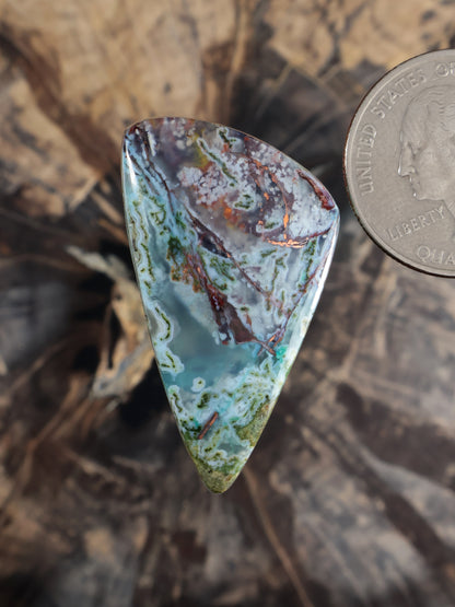 Teardrop chalcedony cabochon with green, blue and copper-brown veining