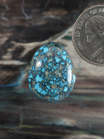 Turquoise blue cabochon with natural webbed matrix, oval gemstone with smooth silver rim