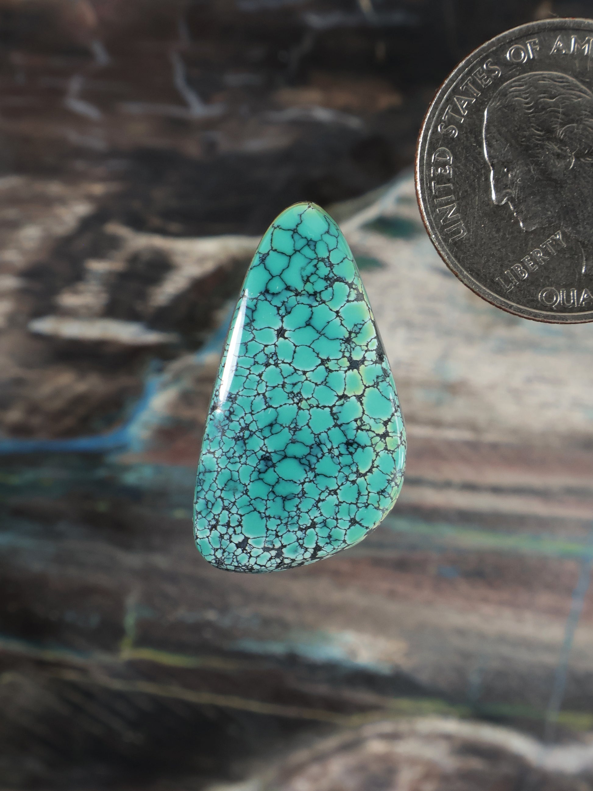 Turquoise spiderweb-pattern cabochon gemstone, teardrop shape