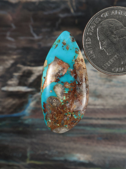 Bisbee turquoise cabochon, teardrop with blue-green stone and brown matrix inclusions