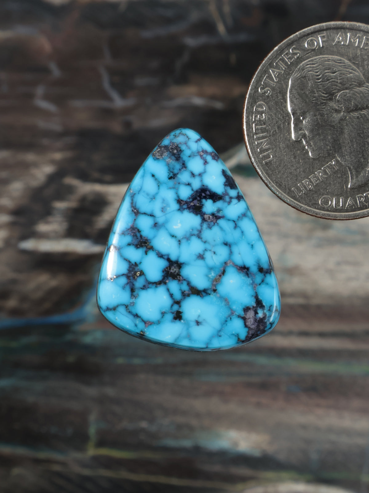 Blue turquoise cabochon gemstone, triangular teardrop shape