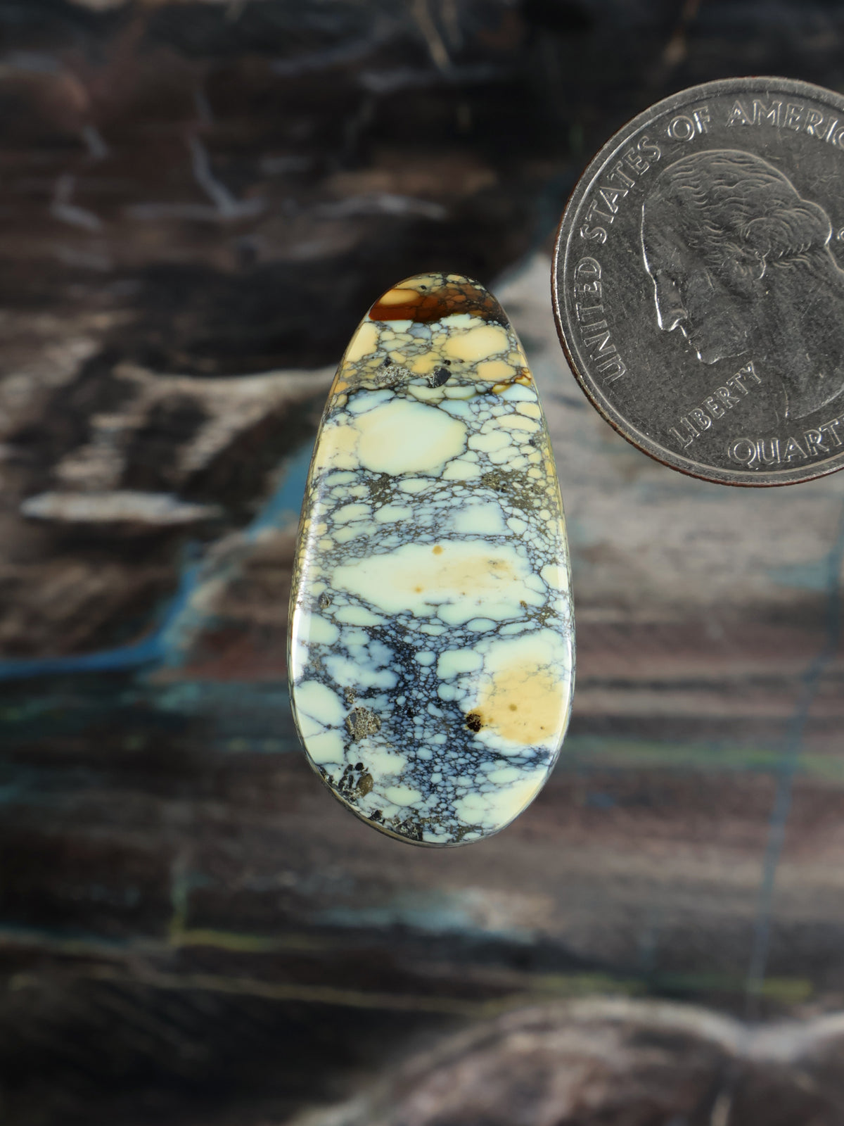 Prince variscite cabochon with oval teardrop shape, yellow, white, and blue web matrix