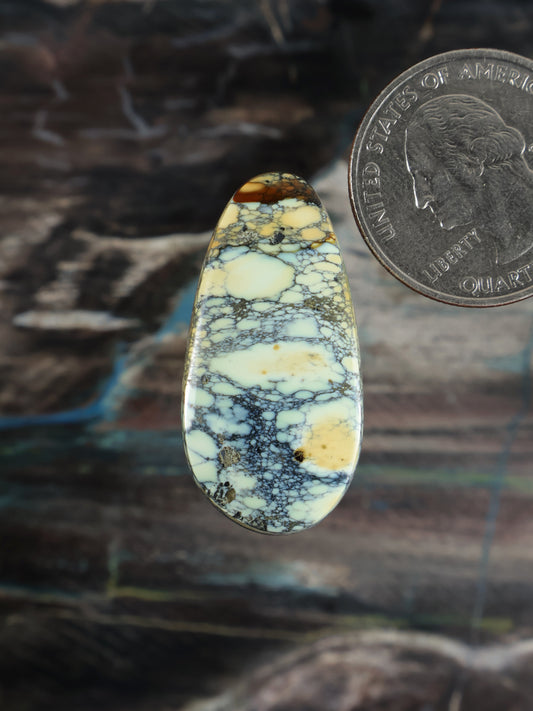 Prince variscite cabochon with oval teardrop shape, yellow, white, and blue web matrix