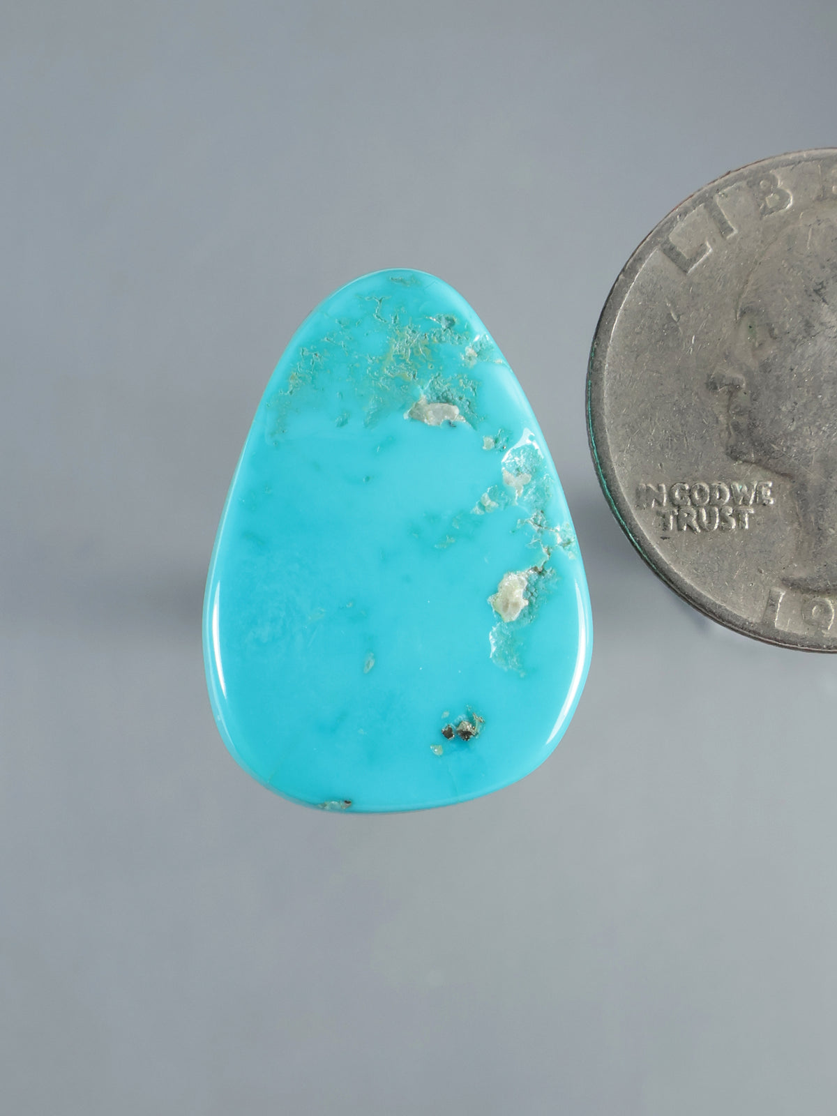 Natural Sleeping Beauty turquoise cabochon, bright blue-green with tan matrix markings