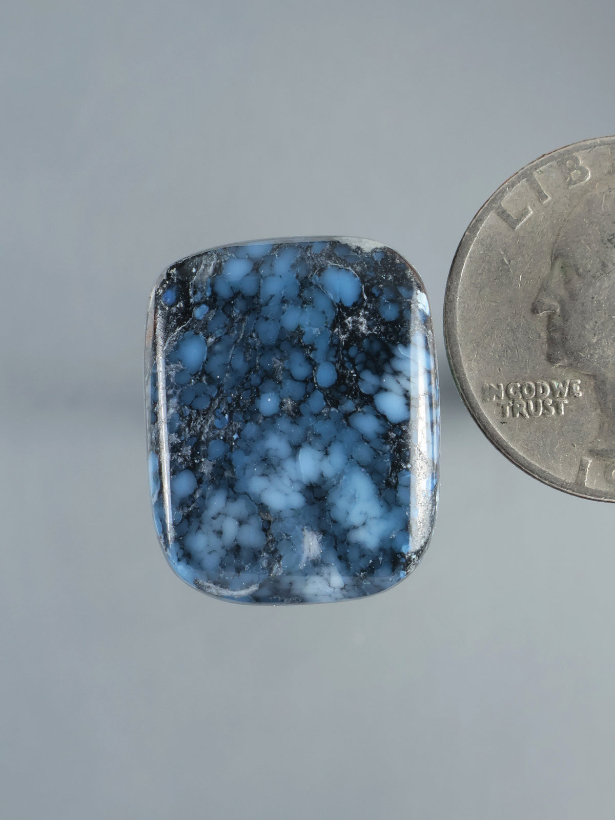 Wild Blue Cabochon B927, polished rectangular blue stone with dark veining