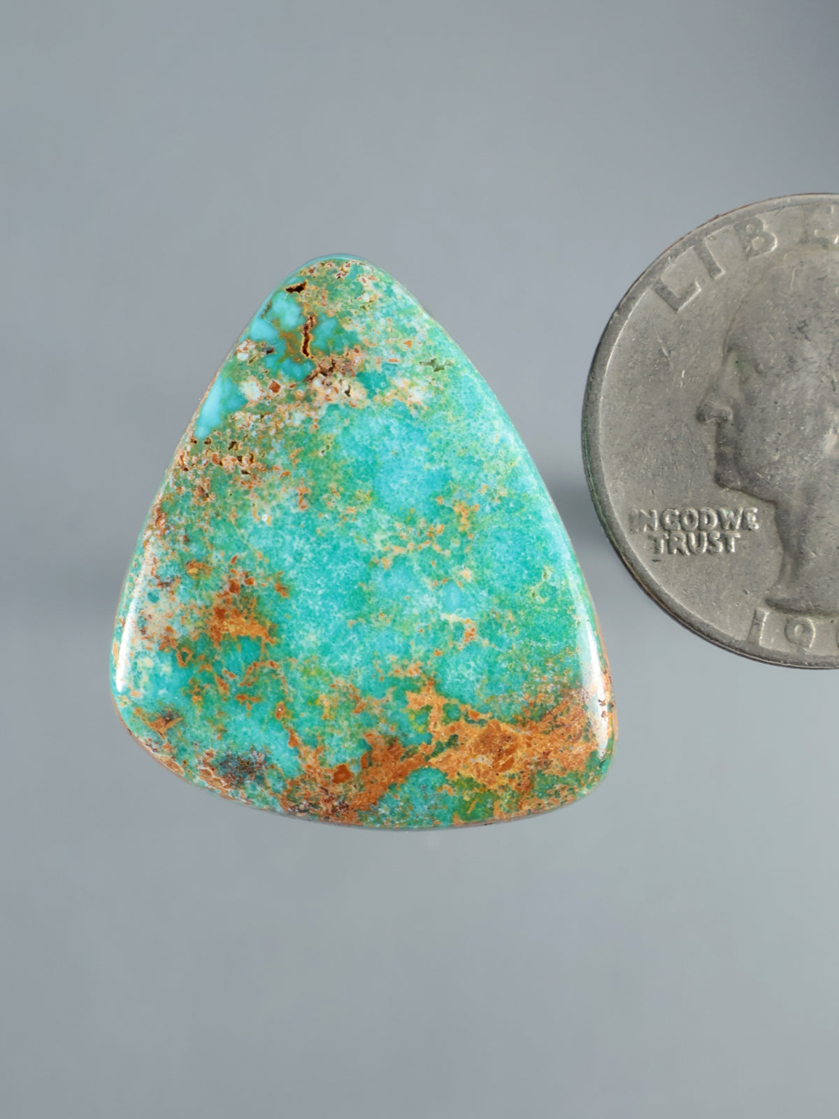 Hubei turquoise cabochon, polished freeform stone with blue-green color and brown matrix