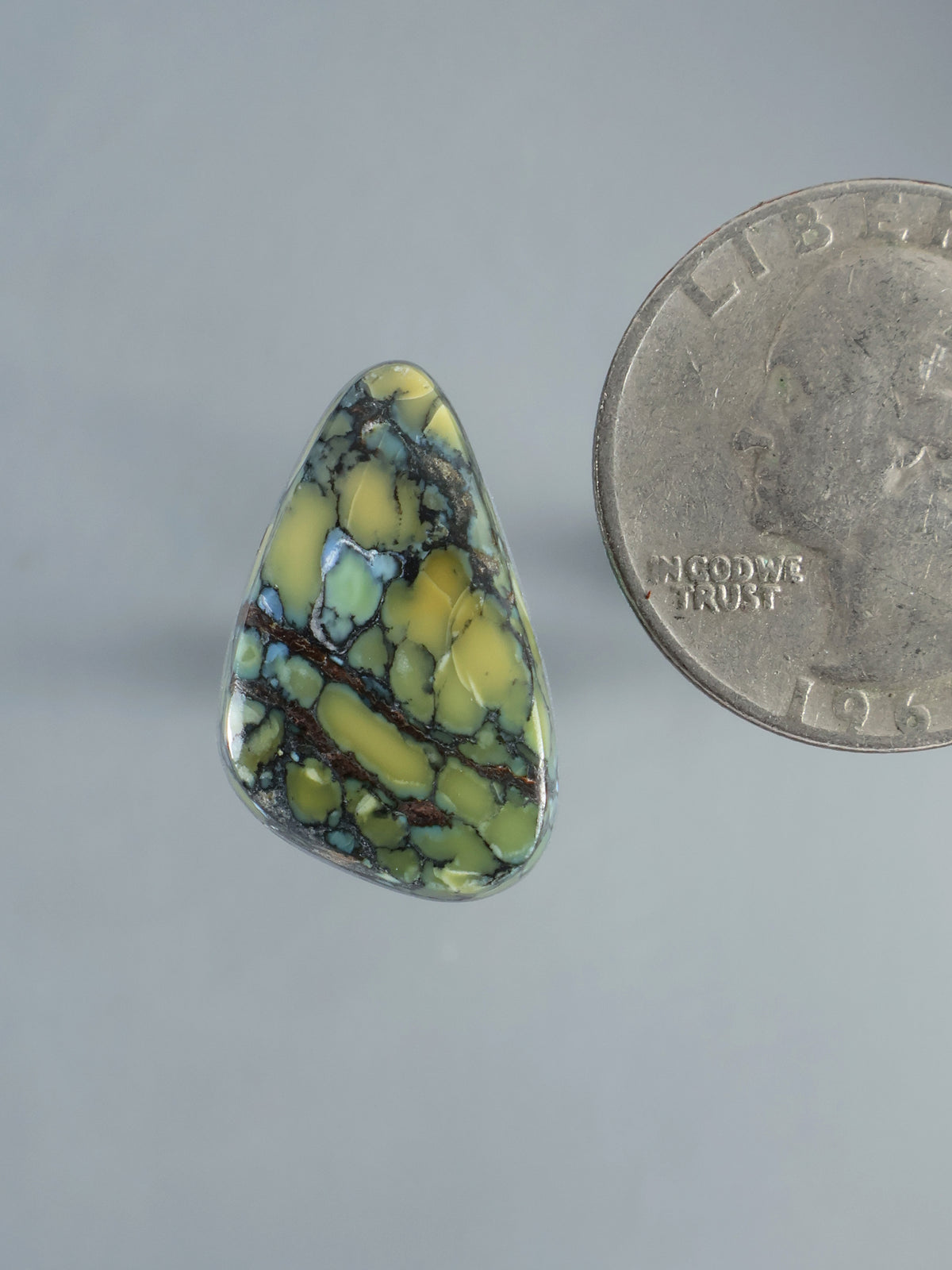 Wild Blue Cabochon B928, polished teardrop stone with yellow-green and blue veining
